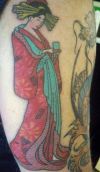 women arm tattoo